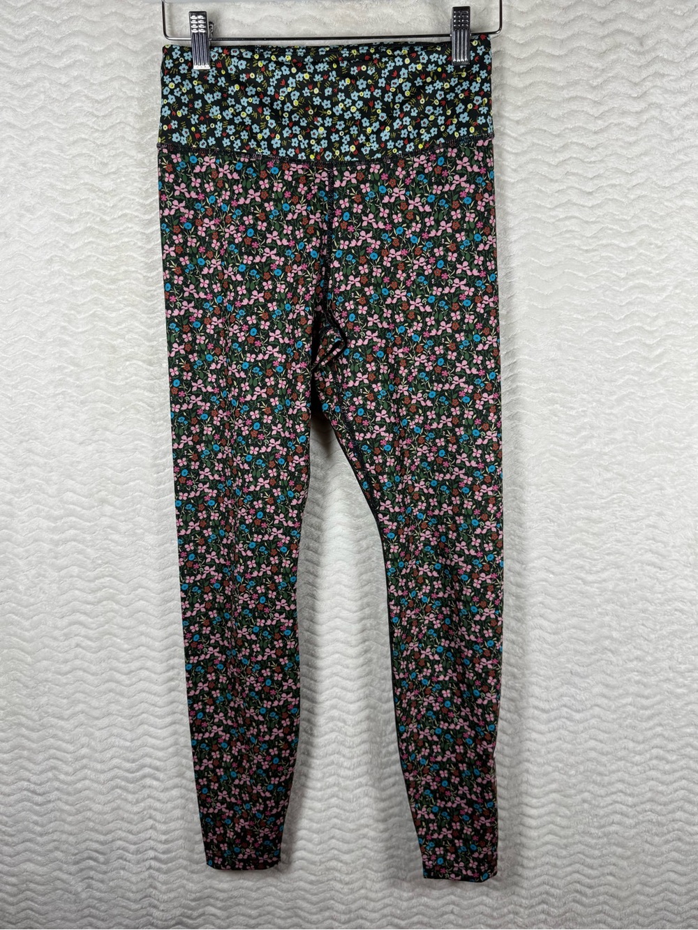 Nike Women's Dri-FIT "One" leggings in a mixed floral print with a high-rise